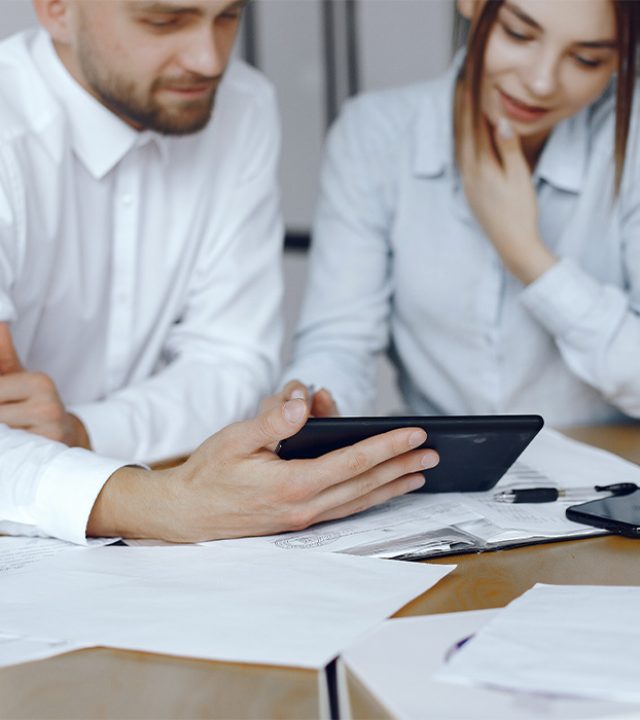 man-with-tablet-business-partners-business-meeting-people-sitting-table