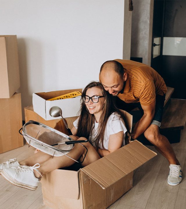 young-family-moving-into-their-new-house
